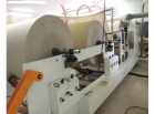 Facial folding and rewinding machine for towels and facial tissue